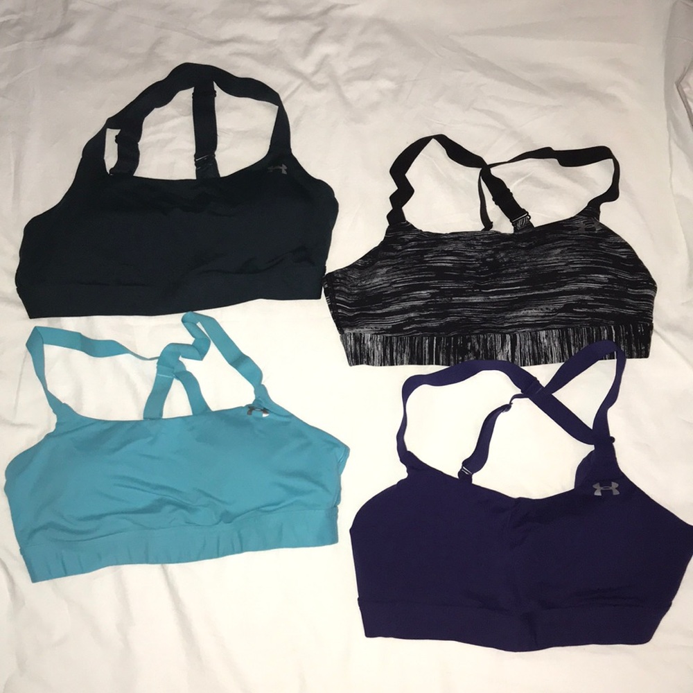 4 medium Under Armour sports bras